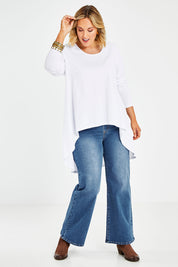 Model Jess wearing size 14 of the Sunshine In Me Long Sleeve Tee in colour White (White), from the front, showing the whole outfit