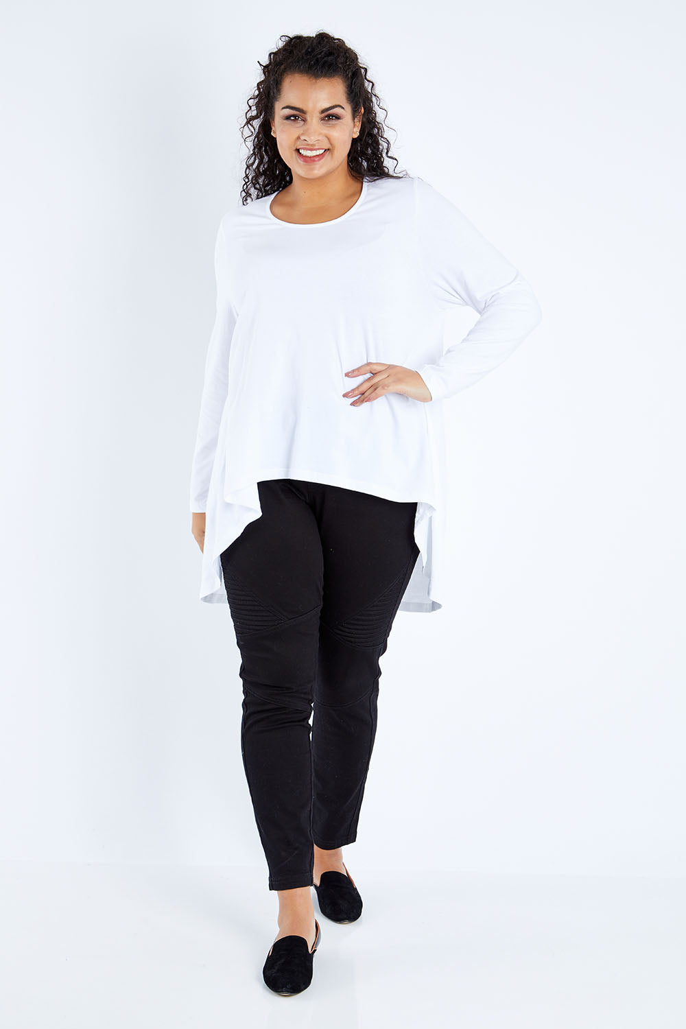Model Sasha-Lee wearing size 16 of the Sunshine In Me Long Sleeve Tee in colour White (White), from the front, showing the whole outfit