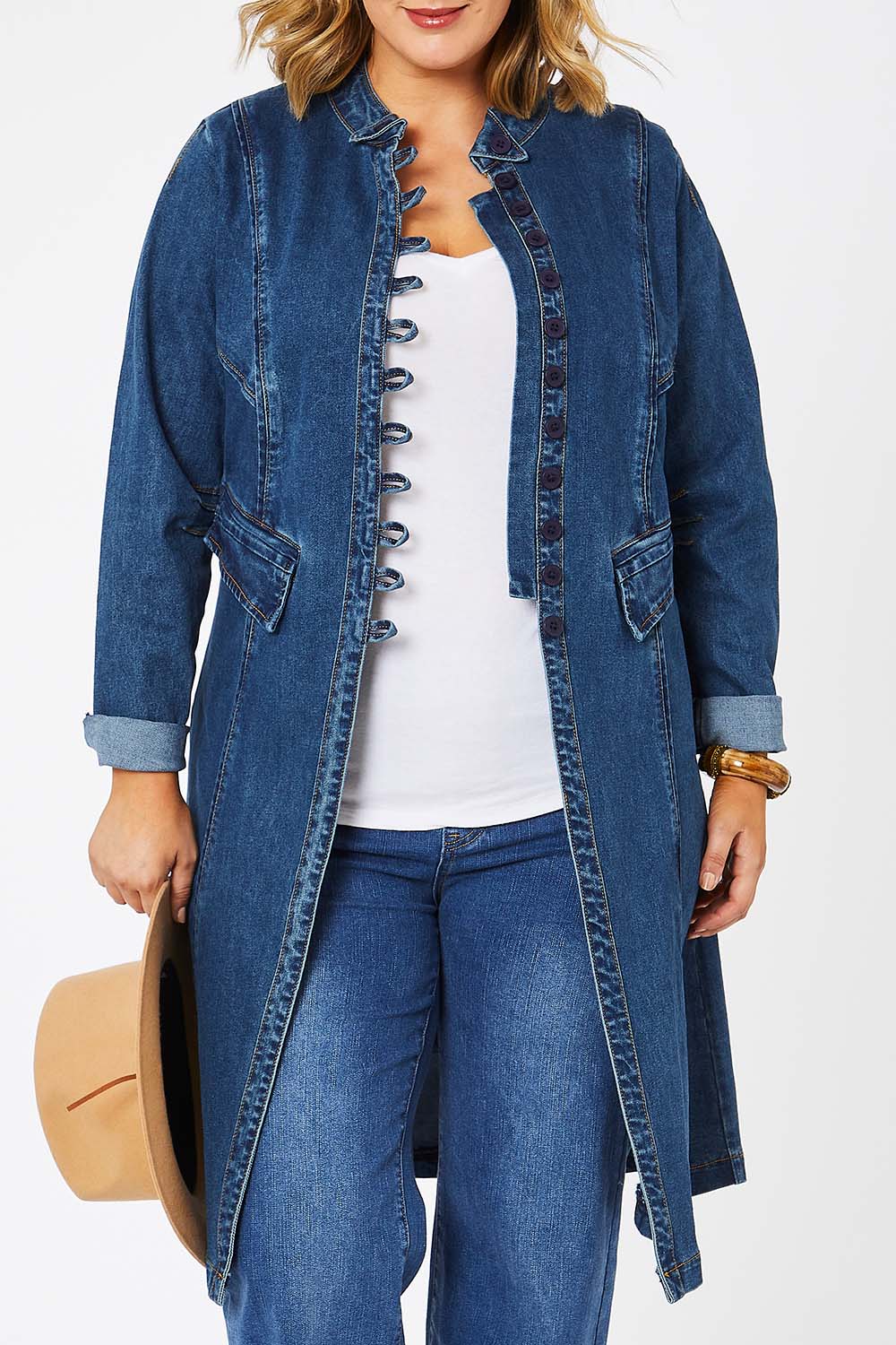 Model Jess wearing size 14 of the Attention To Me Denim Jacket in colour Denim (Blue), from the front, cropped image