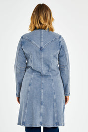 Model Jess wearing size 14 of the Attention To Me Denim Jacket in colour Lightdenim (Blue), from the back
