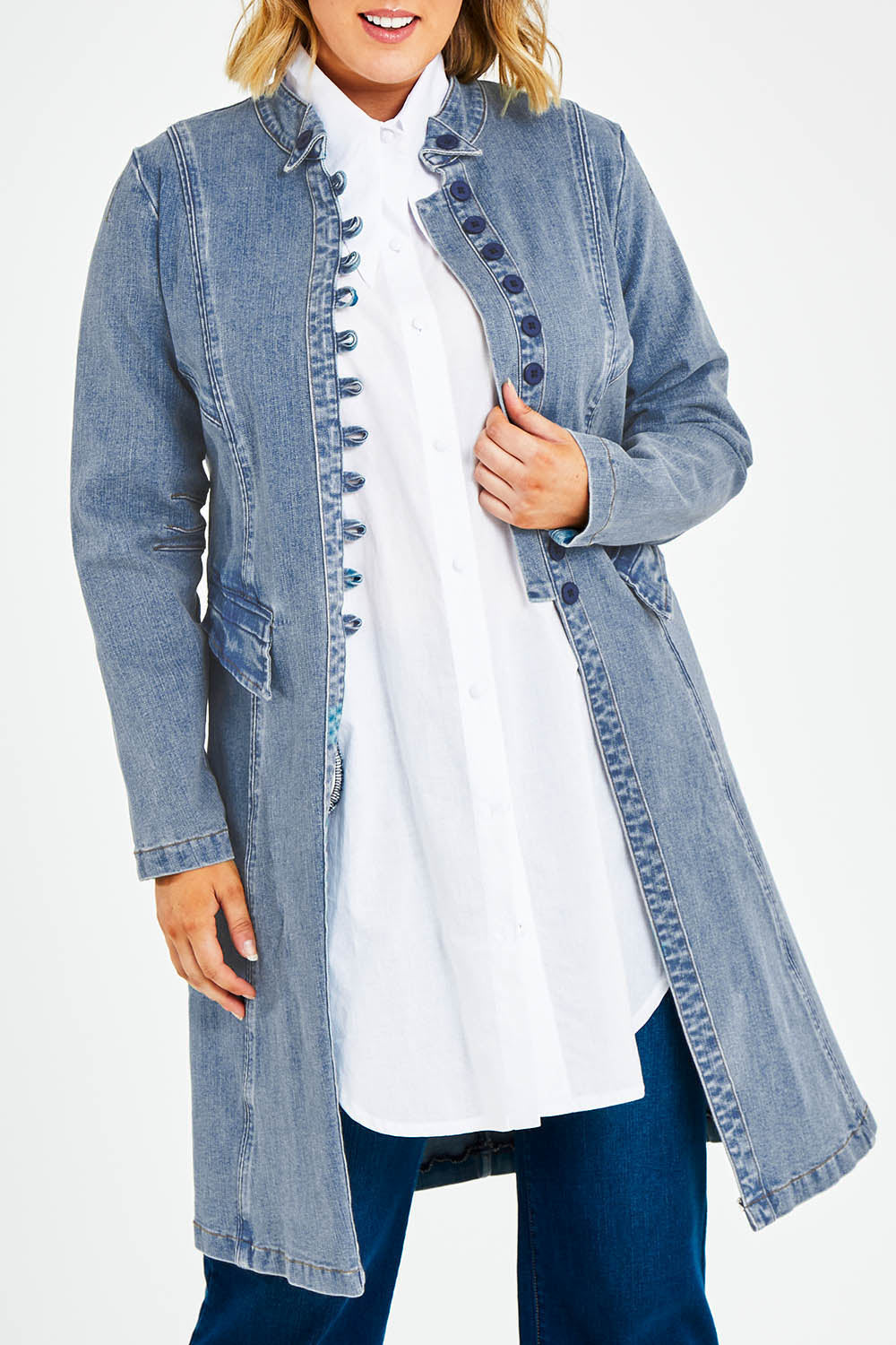 Model Jess wearing size 14 of the Attention To Me Denim Jacket in colour Lightdenim (Blue), from the front, cropped image