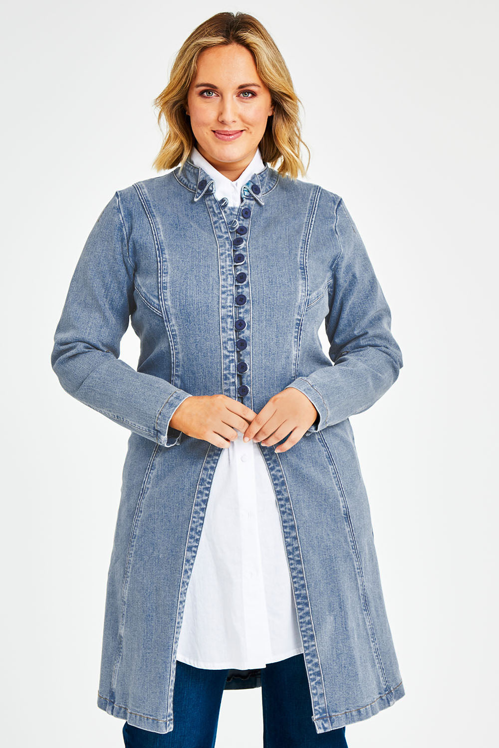 Model Jess wearing size 14 of the Attention To Me Denim Jacket in colour Lightdenim (Blue), from the front, cropped image