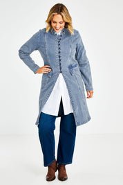 Model Jess wearing size 14 of the Attention To Me Denim Jacket in colour Lightdenim (Blue), from the front, showing the whole outfit