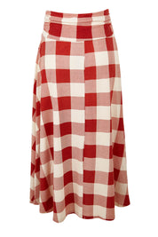 Product shot of the Chasing The Clouds Away Maxi Skirt in colour Rust (Red), from the back