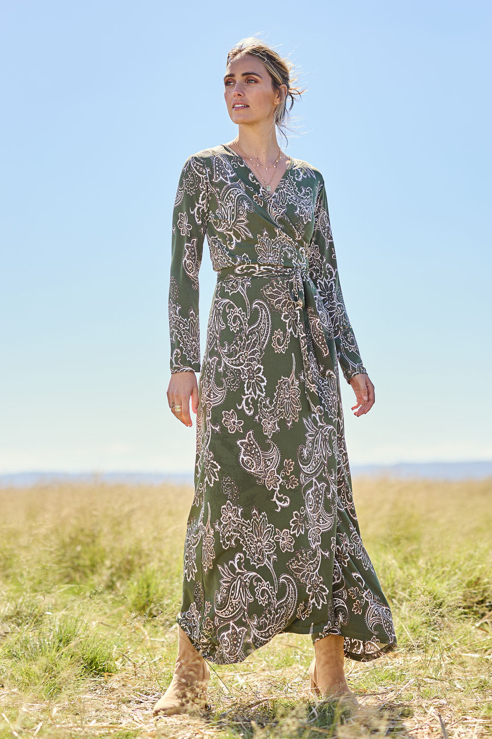 Model Tegan wearing size 10 of the Life Is Beautiful Wrap Maxi Dress in colour Greenpais (Green), from the front, showing the whole outfit