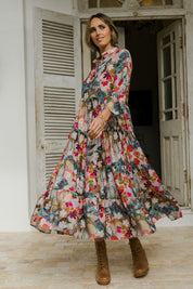 Model Tegan wearing size 10 of the Its Easy Loving You Tiered Dress in colour Fleur (Green), from the front, showing the whole outfit