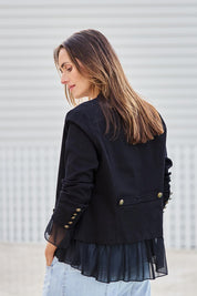 Model Tegand wearing size 10 of the Commander Of Love Jacket - Black in colour Black, from the back
