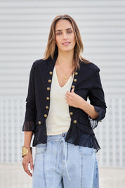 Model Tegand wearing size 10 of the Commander Of Love Jacket - Black in colour Black, in a cropped view
