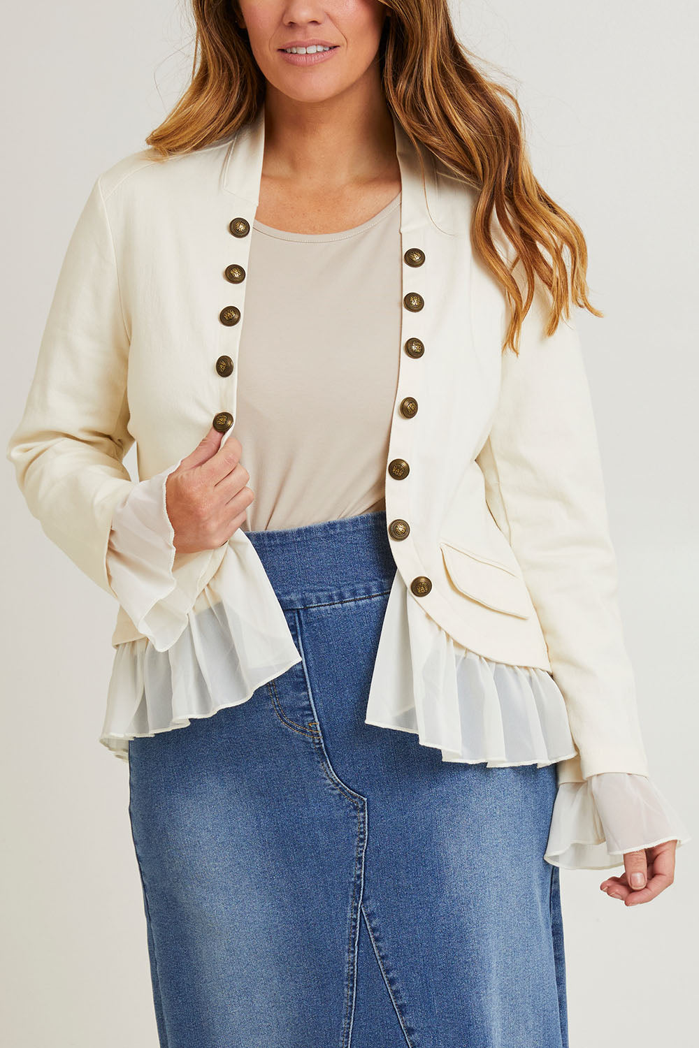 Model Laura wearing size 14 of the Commander Of Love Jacket in colour Ecru, from the front, cropped image
