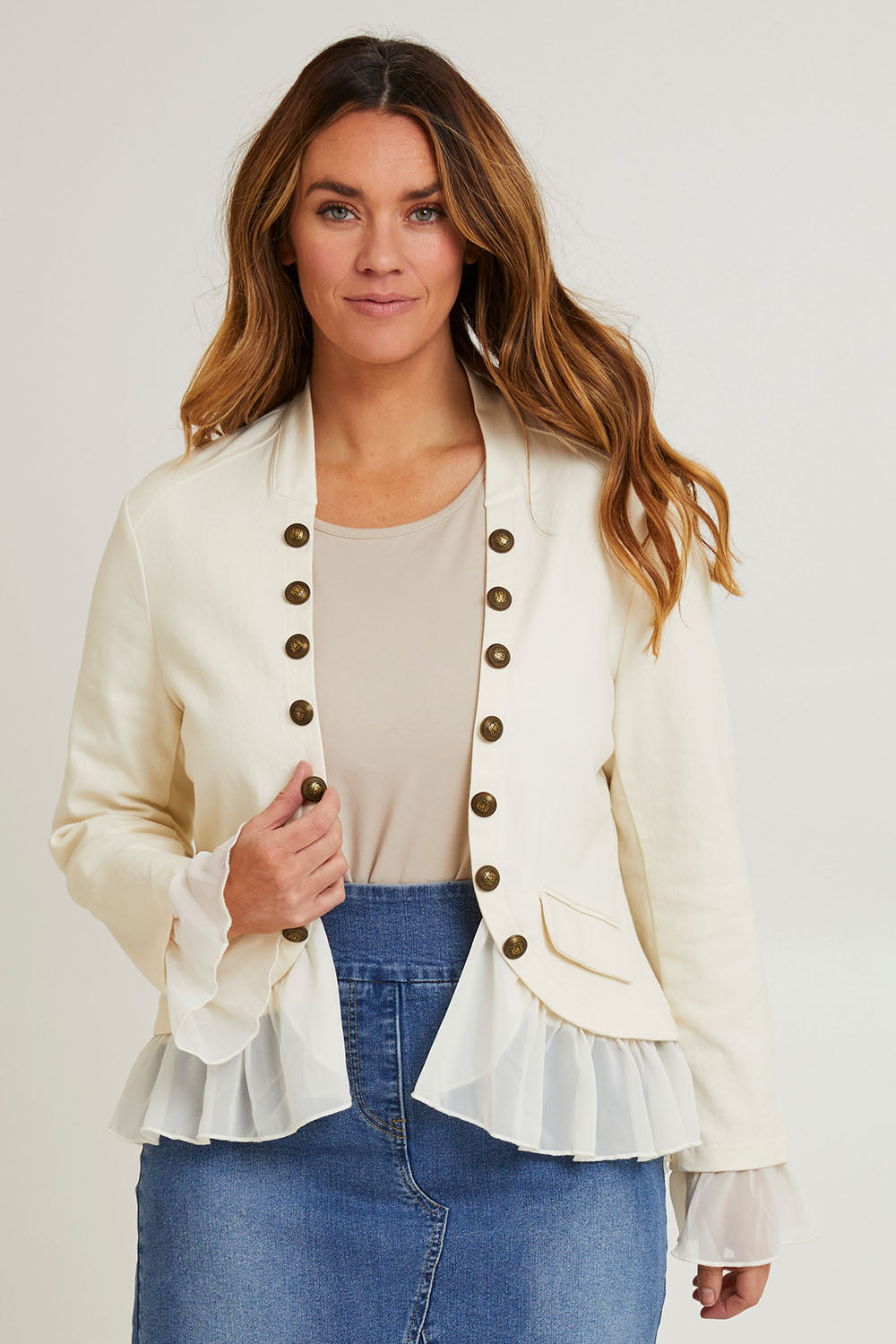 Model Laura wearing size 14 of the Commander Of Love Jacket in colour Ecru, from the front, cropped image