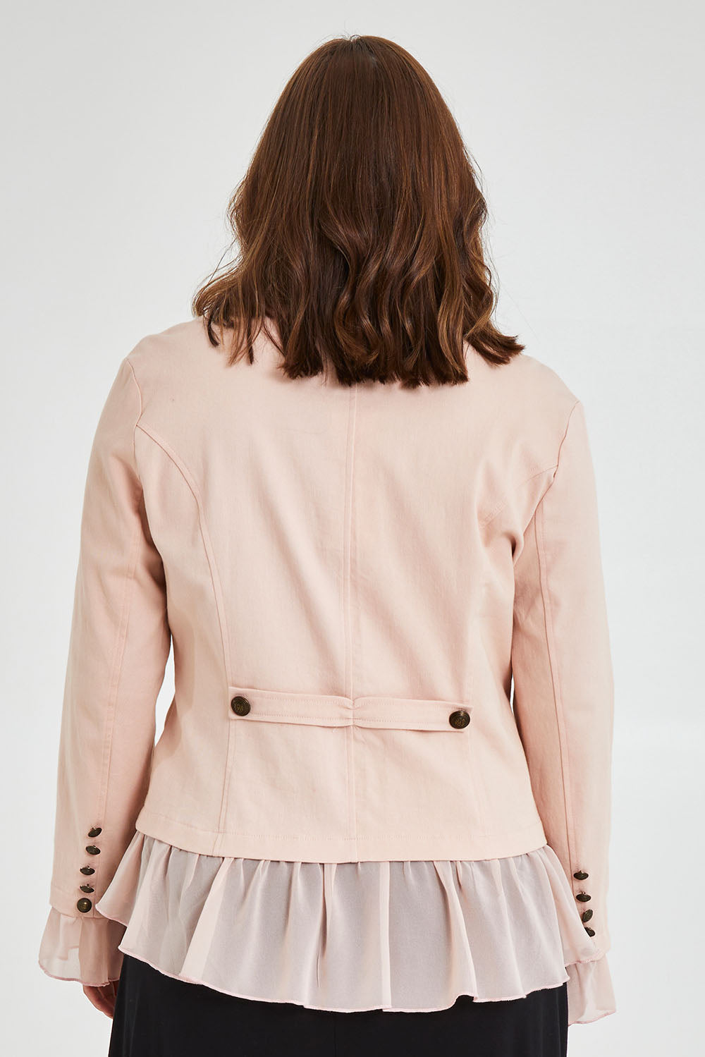 Model Monique wearing size 14 of the Commander Of Love Jacket in colour Palepink (Pink), from the back
