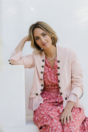 Model Tegan wearing size 10 of the Commander Of Love Jacket in colour Palepink (Pink), from the front, cropped image