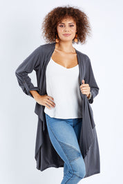 Model Lala wearing size 10 of the Elegant Slumming Cardi in colour Slate (Grey), from the front, cropped image