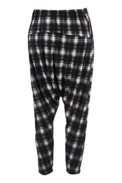 Product shot of the Check Me Out Pants in colour Black (Black), from the back