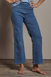 Model Amanda wearing size 10 of the Easy As Plain Pull On Jeans in colour Denim (Blue), from the front, cropped image