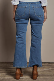 Model Tahnee wearing size 10 of the Easy As Plain Pull On Jeans in colour Denim (Blue), from the back