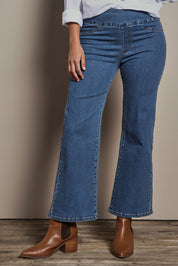 Model Tahnee wearing size 10 of the Easy As Plain Pull On Jeans in colour Denim (Blue), from the front, cropped image