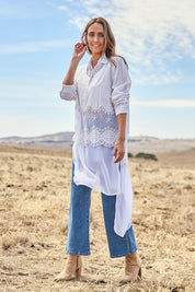 Model Tegan wearing size 10 of the Easy As Plain Pull On Jeans in colour Denim (Blue), from the front, showing the whole outfit