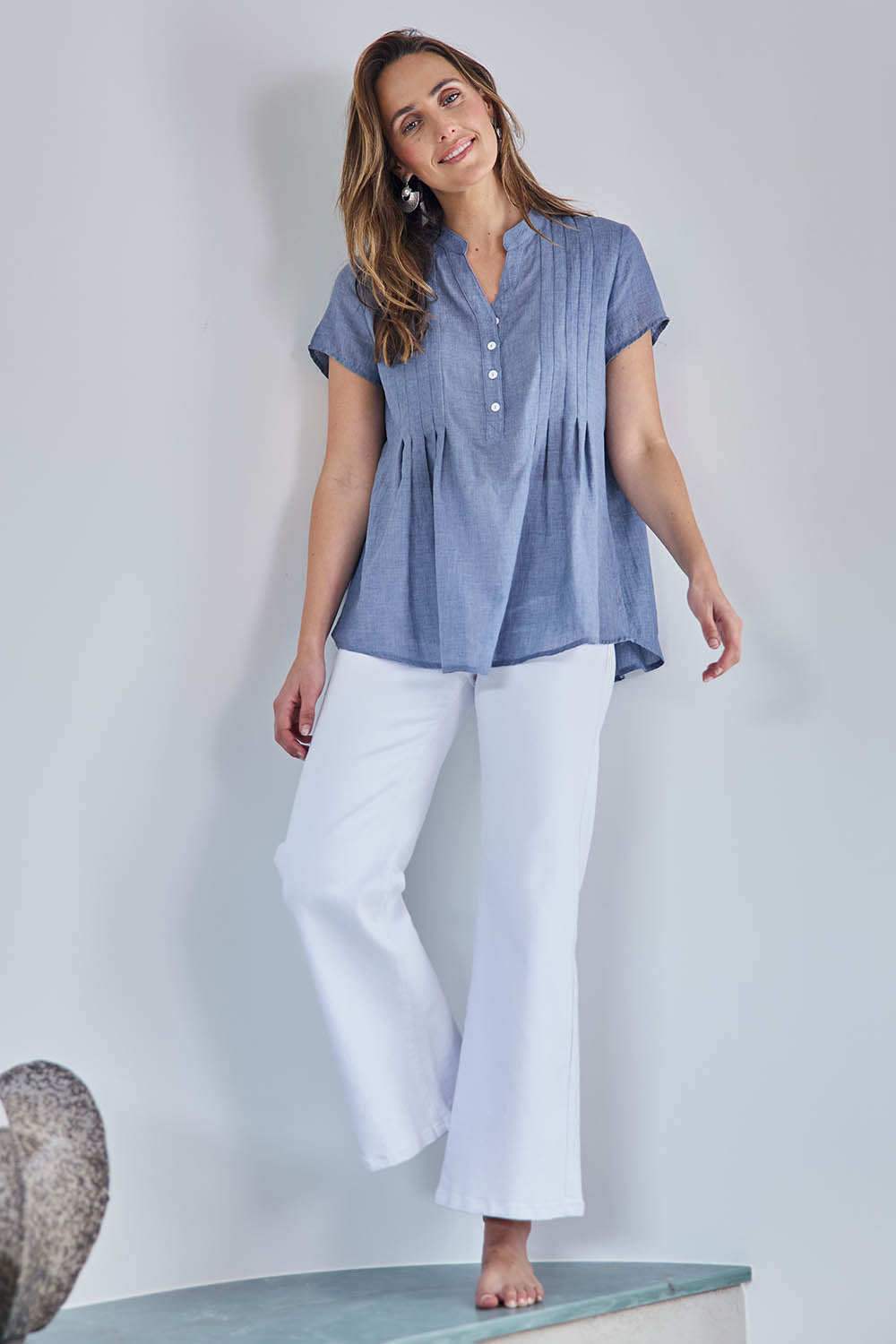 Model Tegand wearing size 10 of the Easy As Plain Pull On Jeans - White in colour White, from the front