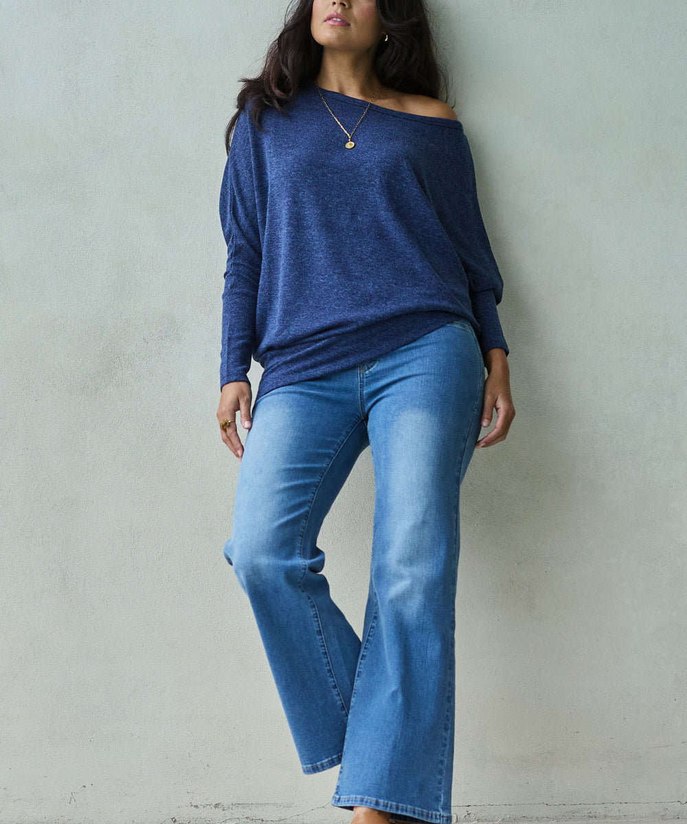 Model Tahnee wearing size 10 of the Easy As Pull On Jeans in colour Denim (Blue), from the front, showing the whole outfit