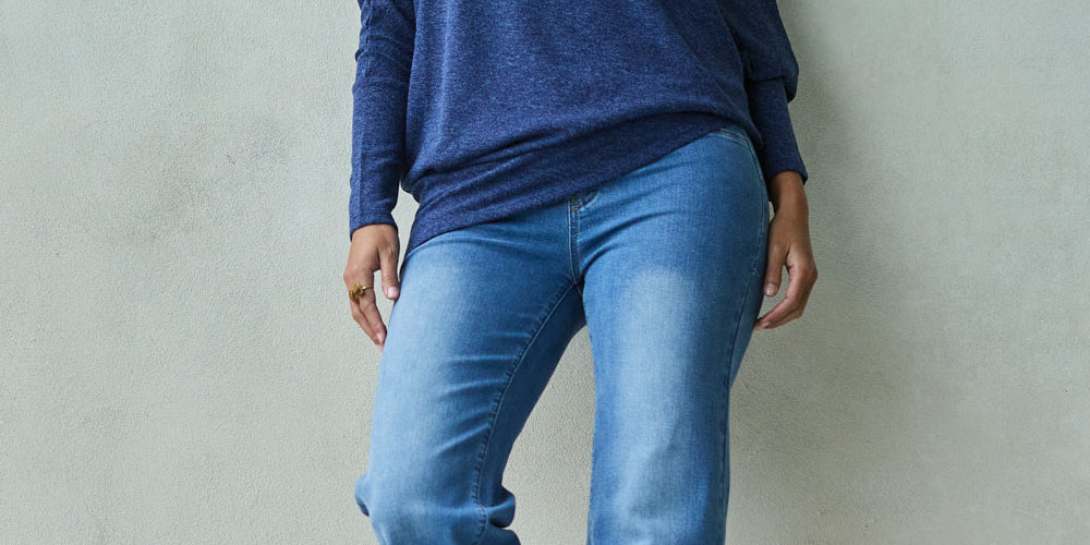 Model Tahnee wearing size 10 of the Easy As Pull On Jeans in colour Denim (Blue), from the front, showing the whole outfit
