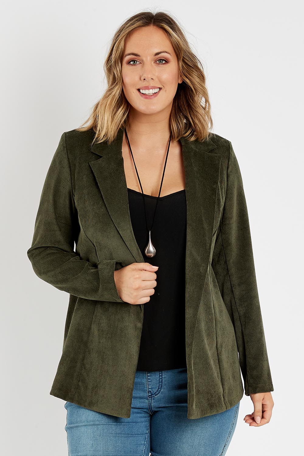 Model Jess wearing size 14 of the Highland Cord Blazer in colour Pine (Green), from the front, cropped image