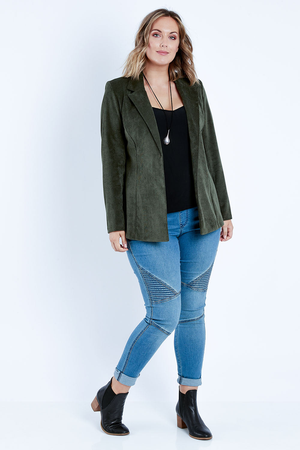 Model Jess wearing size 14 of the Highland Cord Blazer in colour Pine (Green), from the front, showing the whole outfit