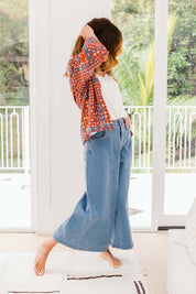 Model Ilona wearing size 10 of the Running in Golden Fields Cropped Jeans in colour Denim (Blue), from the front, showing the whole outfit