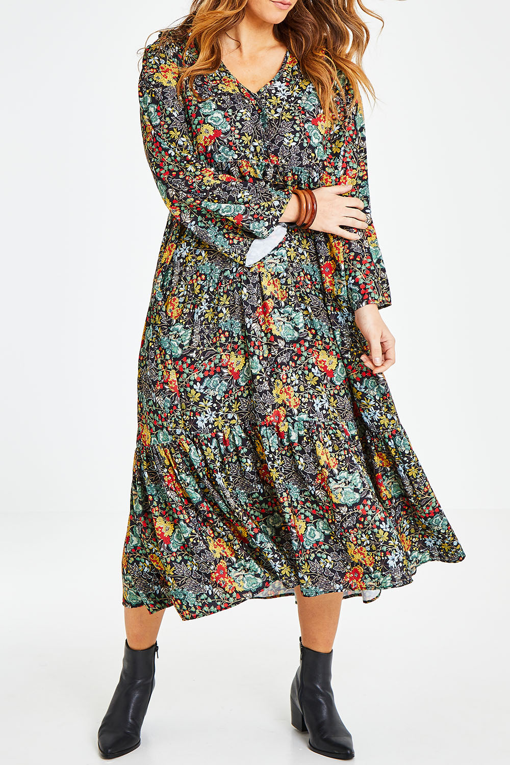 Model Laura wearing size 14 of the Field Of Flowers Dress in colour Black (Black), from the front, cropped image