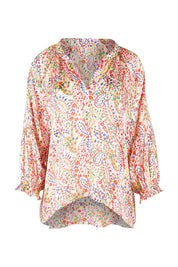 Product shot of the Bright As A Button Blouse in colour Confetti (White), from the front