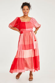 Model Noli wearing size 14 of the Twirl Worthy Cotton Maxi Dress in colour Redpink (Pink), from the front, showing the whole outfit