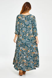 Model Laura wearing size 14 of the You Make Me Happy Maxi Dress in colour Darkteal (Green), from the front, showing the whole outfit