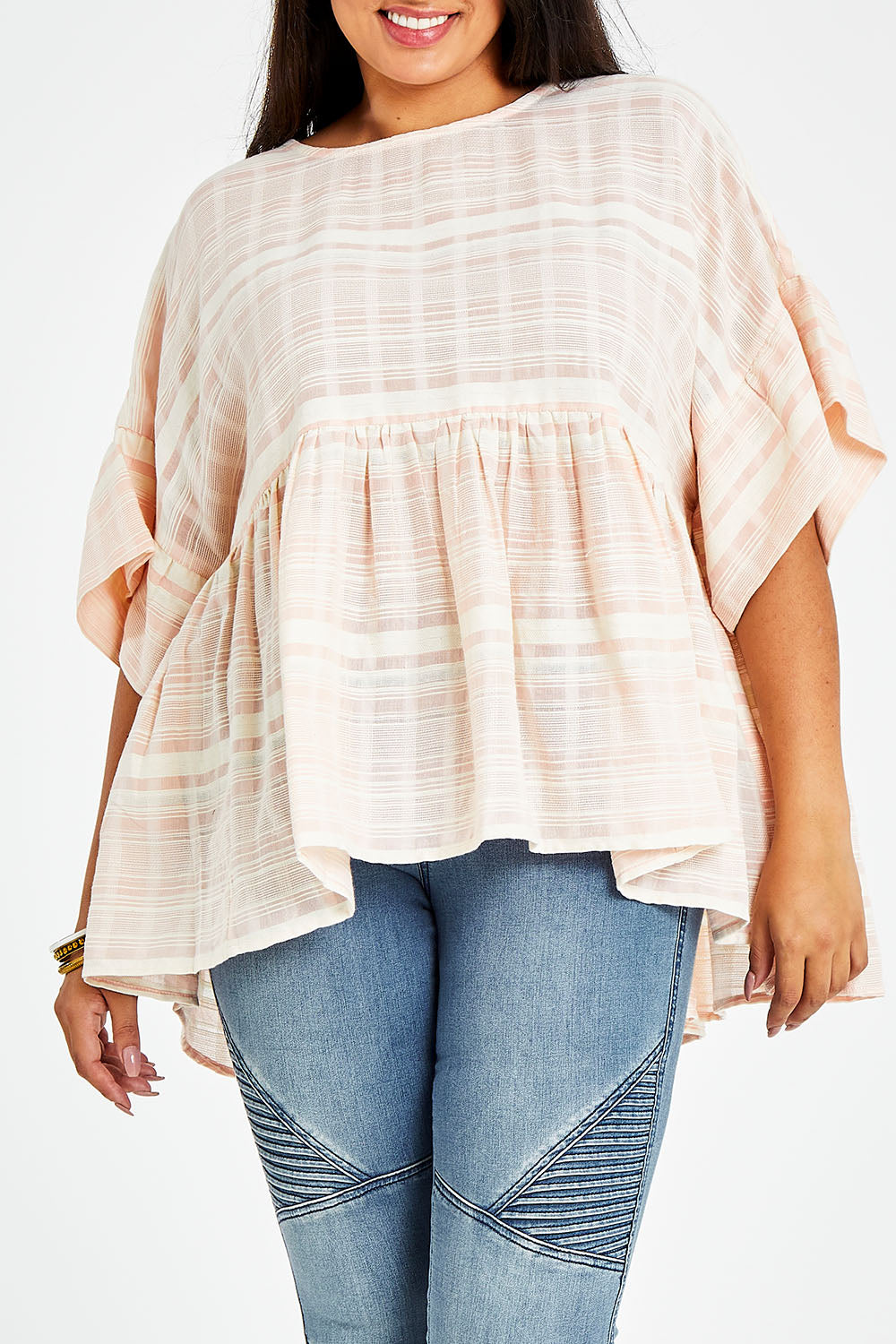 Model Sasha-Lee wearing size 16 of the Perfect As You Are Stripe Top in colour Peach (Pink), from the front, cropped image