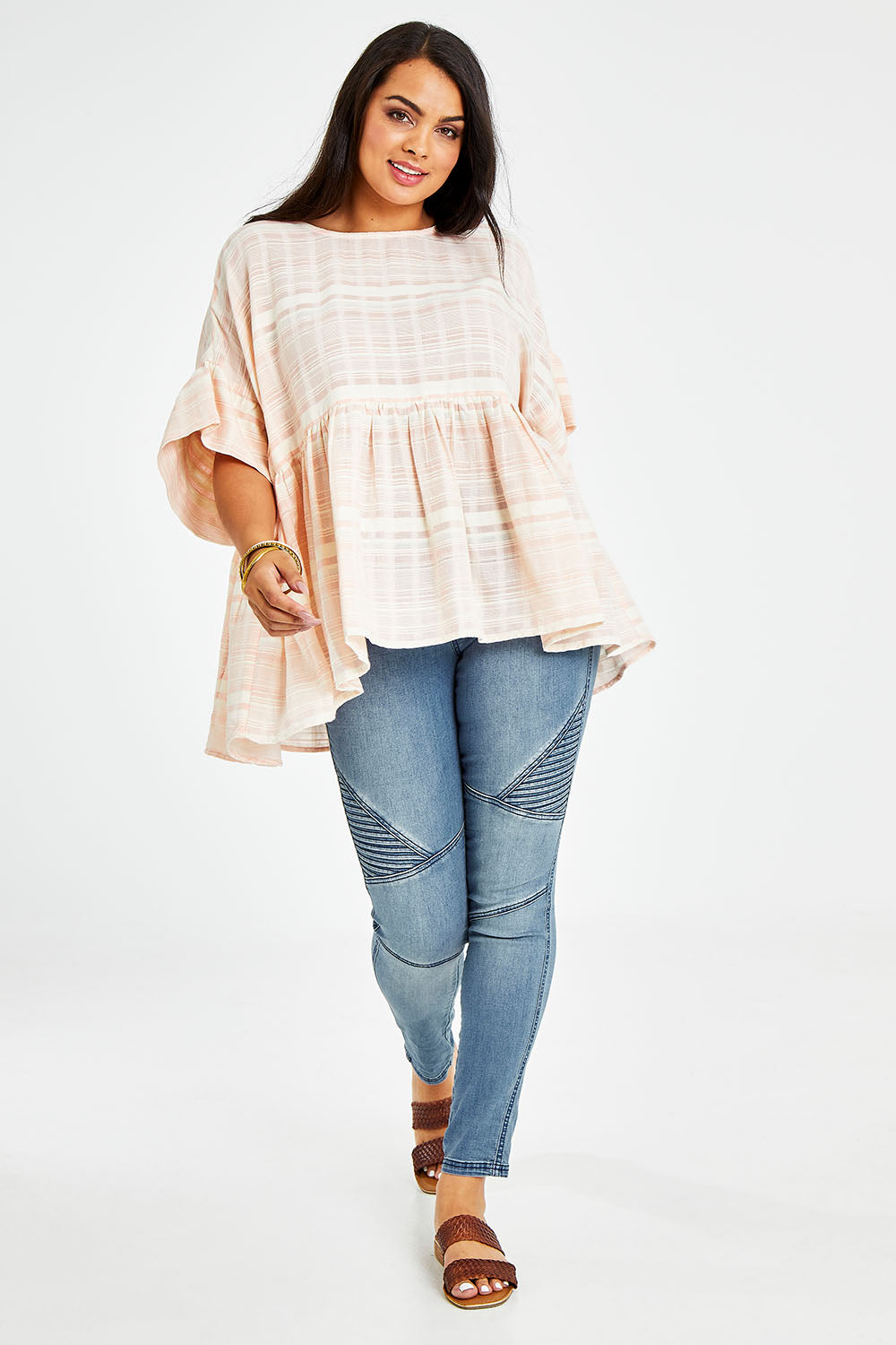 Model Sasha-Lee wearing size 16 of the Perfect As You Are Stripe Top in colour Peach (Pink), from the front, showing the whole outfit