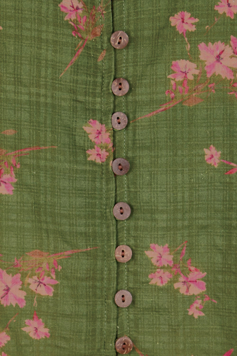 Product shot of the Cute As A Button Printed Blouse - Greenpink in colour Greenpink, showing detail