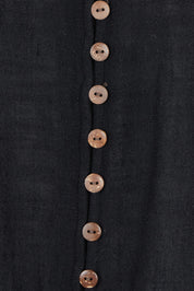 Product shot of the Cute As A Button Blouse in colour Black (Black), detail