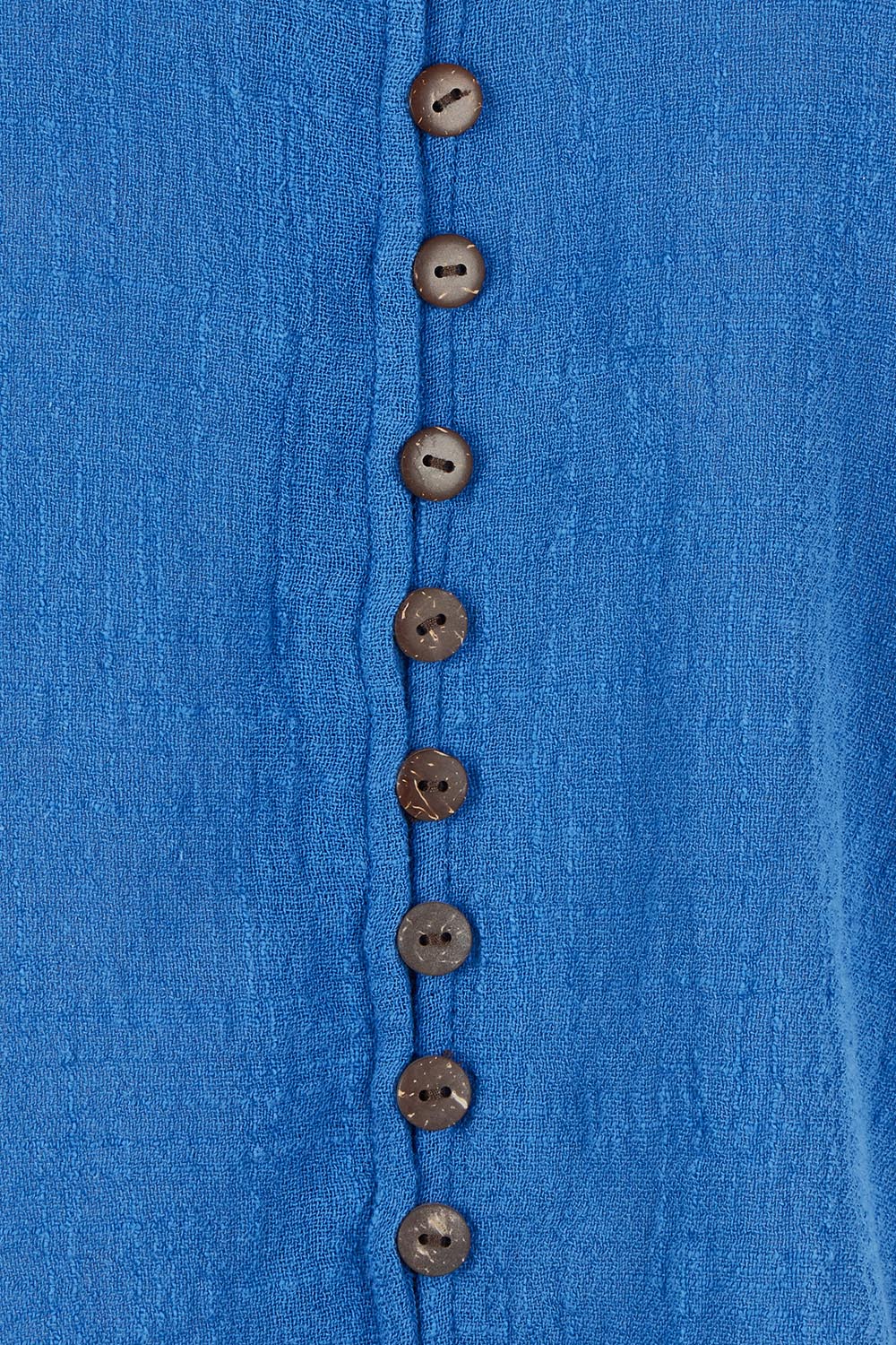 Product shot of the Cute As A Button Blouse in colour Blue (Blue), detail
