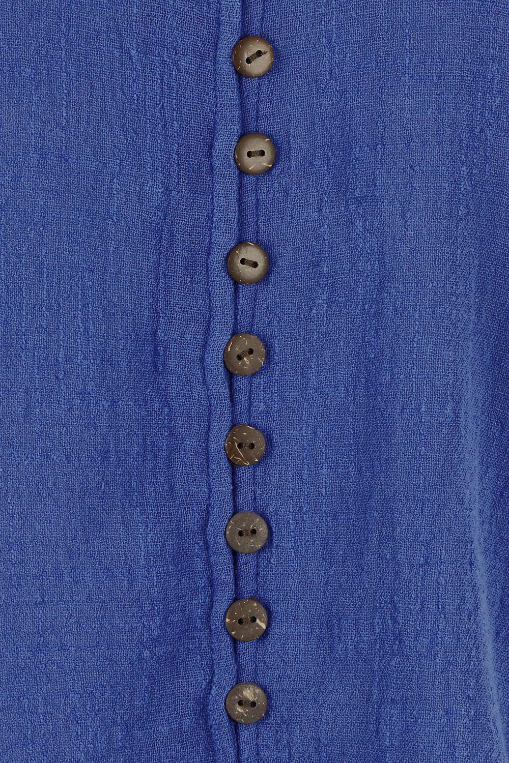 Product shot of the Cute As A Button Cotton Blouse - Blue in colour Blue, showing detail