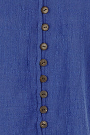 Product shot of the Cute As A Button Cotton Blouse - Blue in colour Blue, showing detail