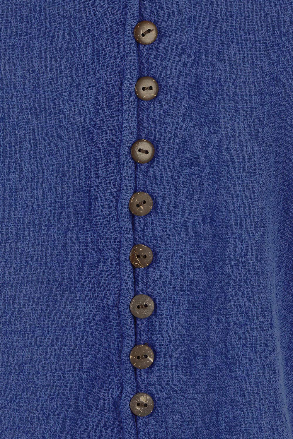 Product shot of the Cute As A Button Cotton Blouse - Blue in colour Blue, showing detail