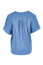 Product shot of the Cute As A Button Blouse – Denim in colour Denim, from the back