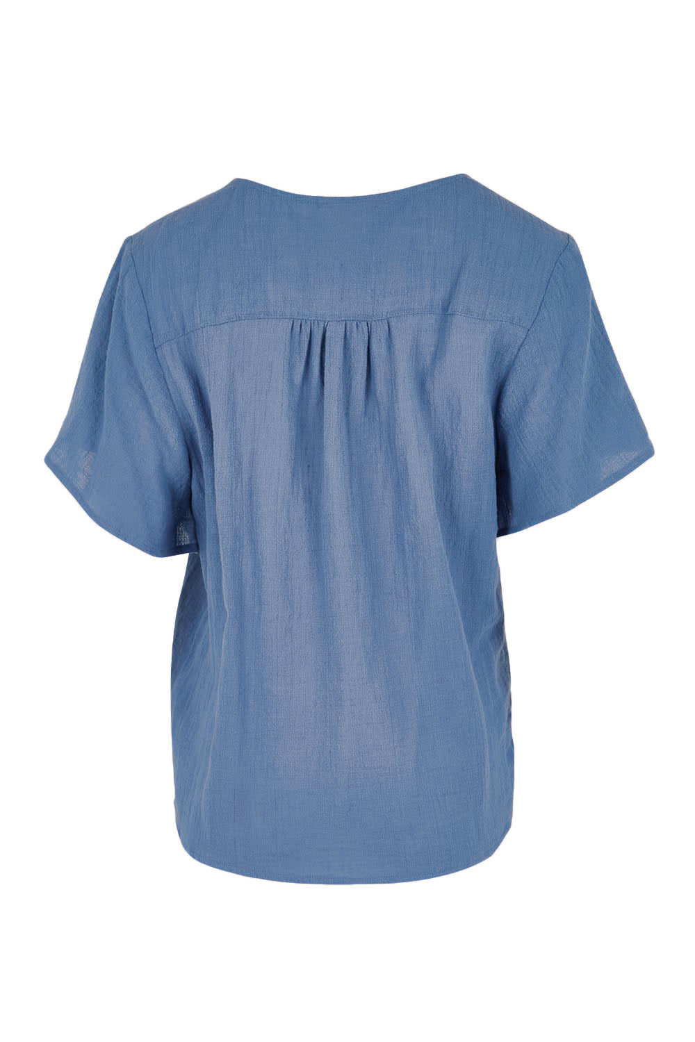 Product shot of the Cute As A Button Blouse – Denim in colour Denim, from the back