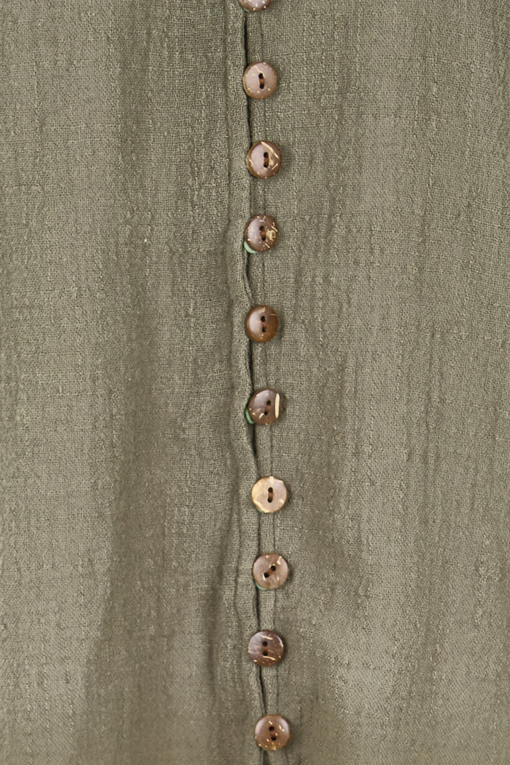 Product shot of the Cute As A Button Blouse – Forrest in colour Forrest, showing detail