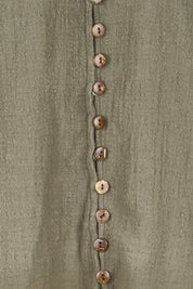 Product shot of the Cute As A Button Blouse – Forrest in colour Forrest, showing detail