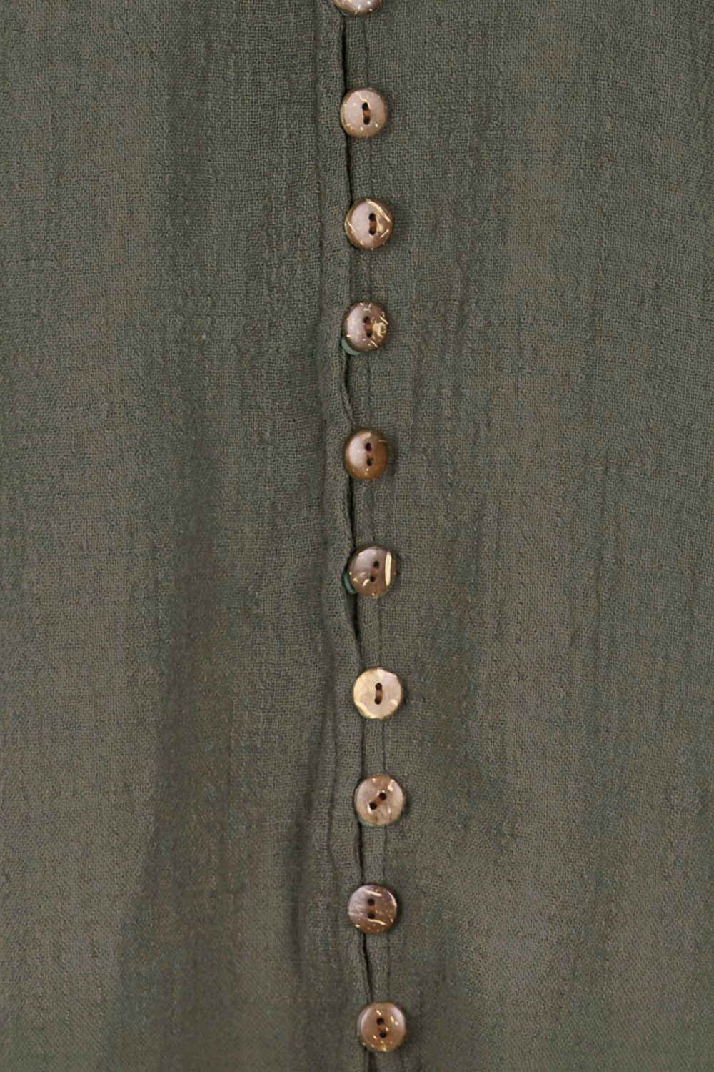 Product shot of the Cute As A Button Blouse – Forrest in colour Forrest, showing detail