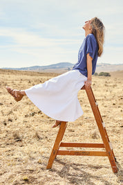 Model Tegan wearing size 10 of the Cute As A Button Blouse in colour Frenchblue (Blue), from the front, showing the whole outfit