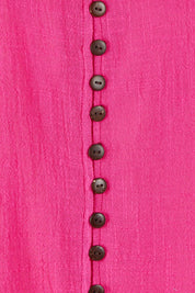 Product shot of the Cute As A Button Blouse in colour Hotpink (Pink), detail