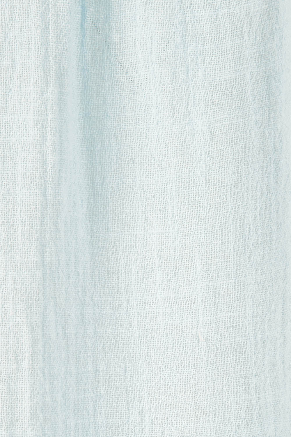 Product shot of the Cute As A Button Blouse in colour Sky (Blue), detail
