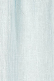 Product shot of the Cute As A Button Blouse in colour Sky (Blue), detail