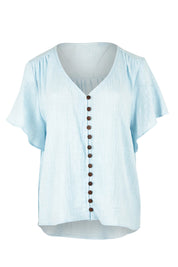 Product shot of the Cute As A Button Blouse in colour Sky (Blue), from the front